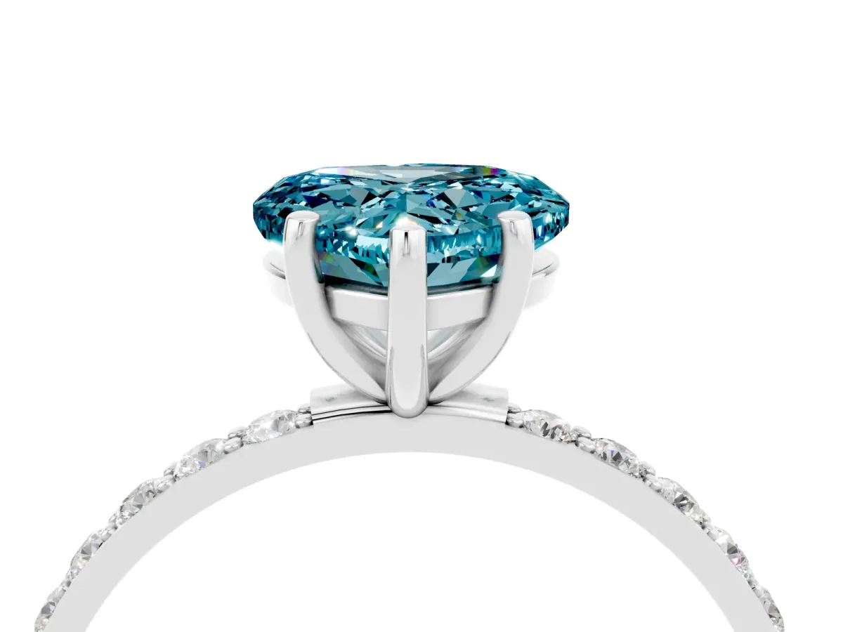 Heart Cut Blue Topaz Solitaire Ring with Round Pavé Band and Prong Setting Silver