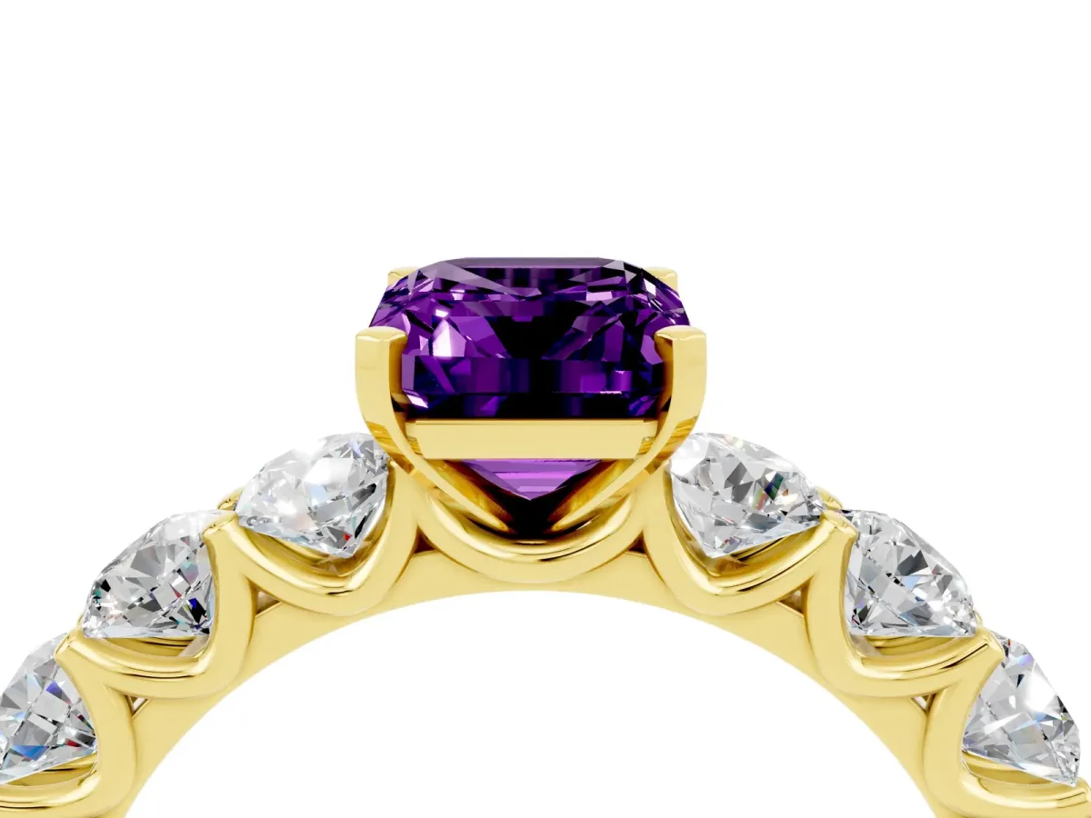 Emerald Cut Amethyst Prong Setting with Side Stones on a Pave Band Yellow gold