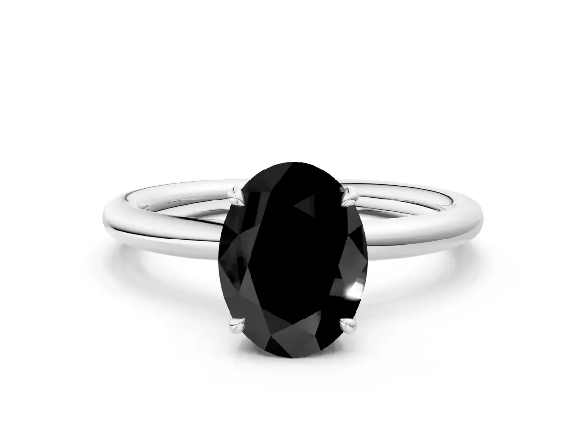 Fancy Black Oval Cut Diamond Solitaire Ring with Thin Band and Four-Prong Setting White gold