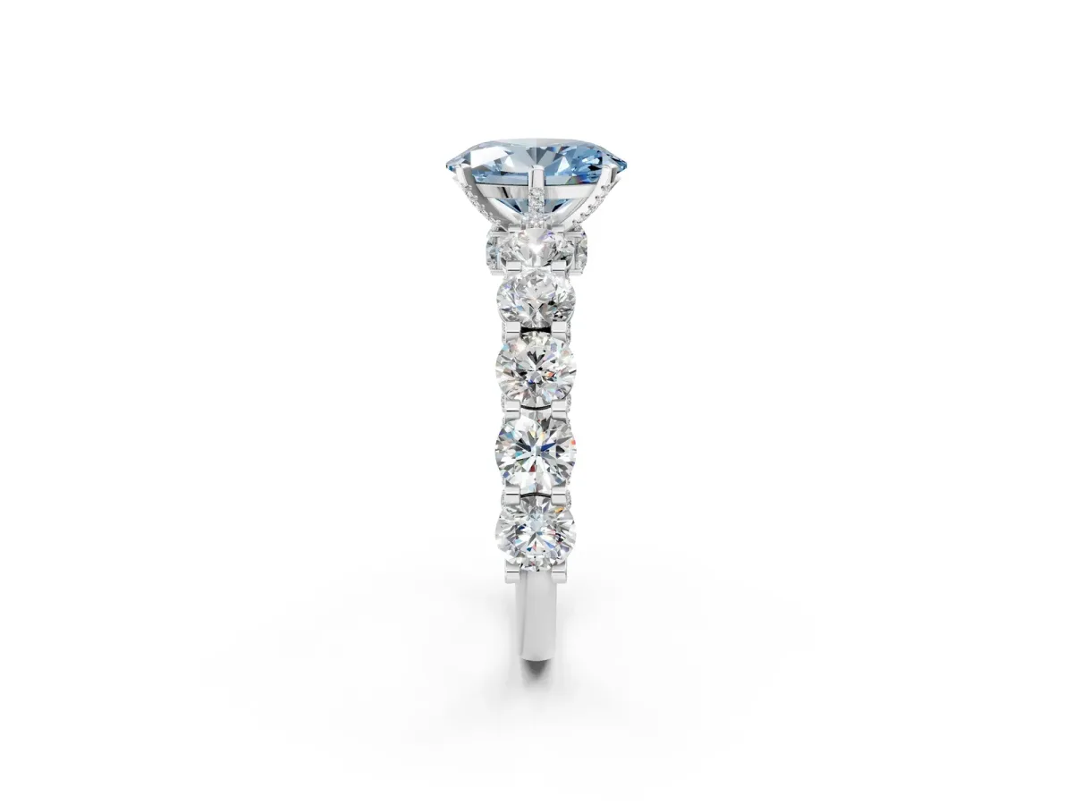 Fancy Blue Oval Cut Diamond Side Stone Engagement Ring with Four-Prong Setting White gold
