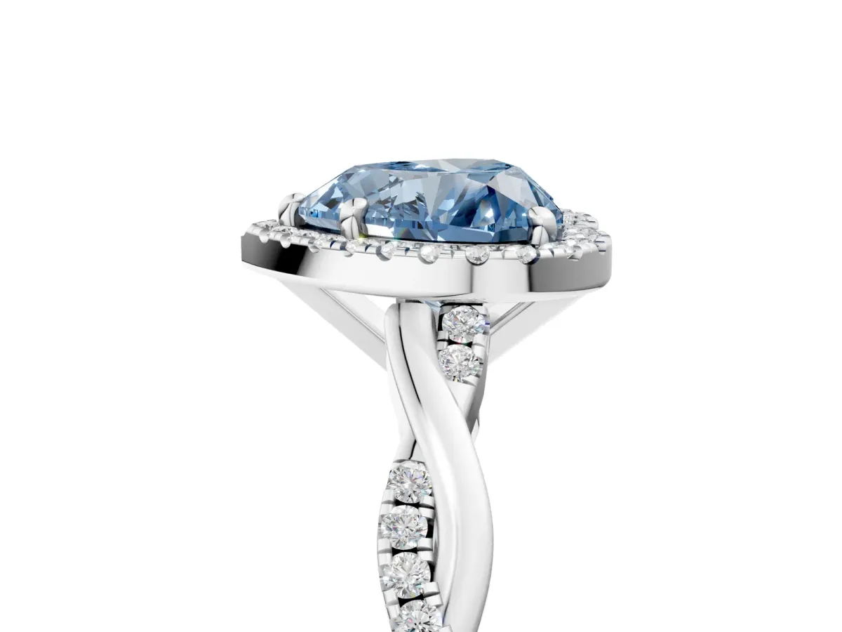 Fancy Blue Heart Cut Cut Halo Twisted Band Four-Prong Ring Platinum
