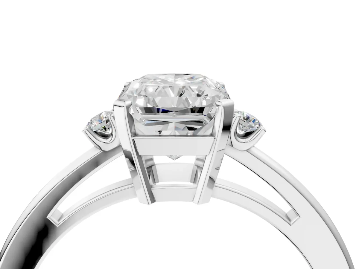 Radiant Cut Cut Three-Stone Solitaire Ring with Round Accent Diamonds and Four-Prong Setting Platinum
