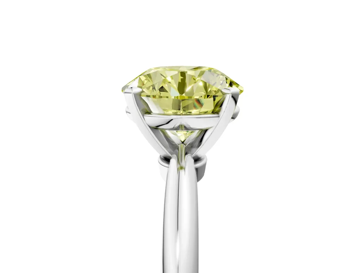 Fancy Yellow Round Cut Diamond Solitaire Ring with Six-Prong Setting and Classic Band Silver