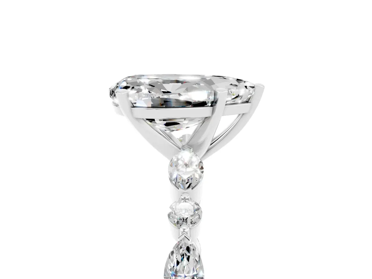 Pear Cut Moissanite Ring with Marquise and Round Side Stones and Four-Prong Setting Silver