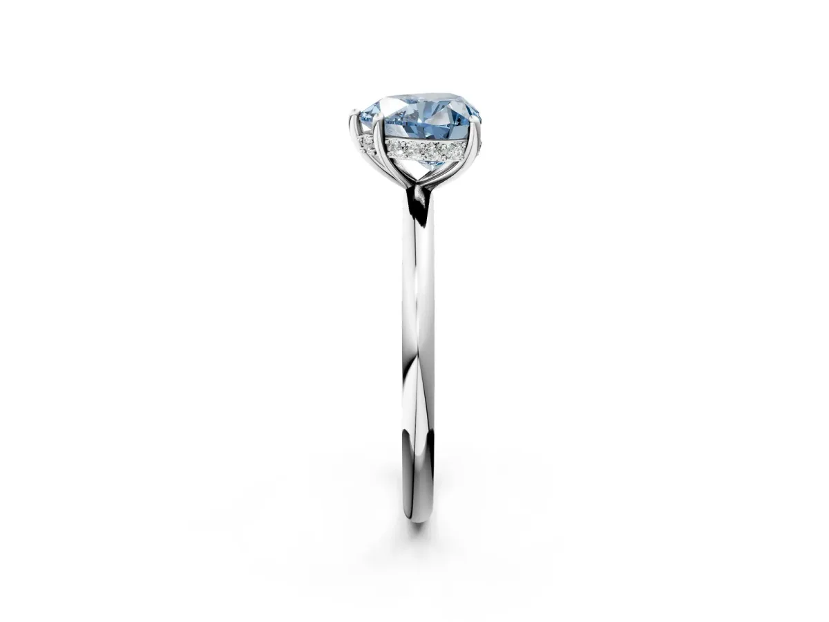 Fancy Blue Heart Cut Solitaire Diamond Ring with a Classic Band and Four-Prong Setting Platinum