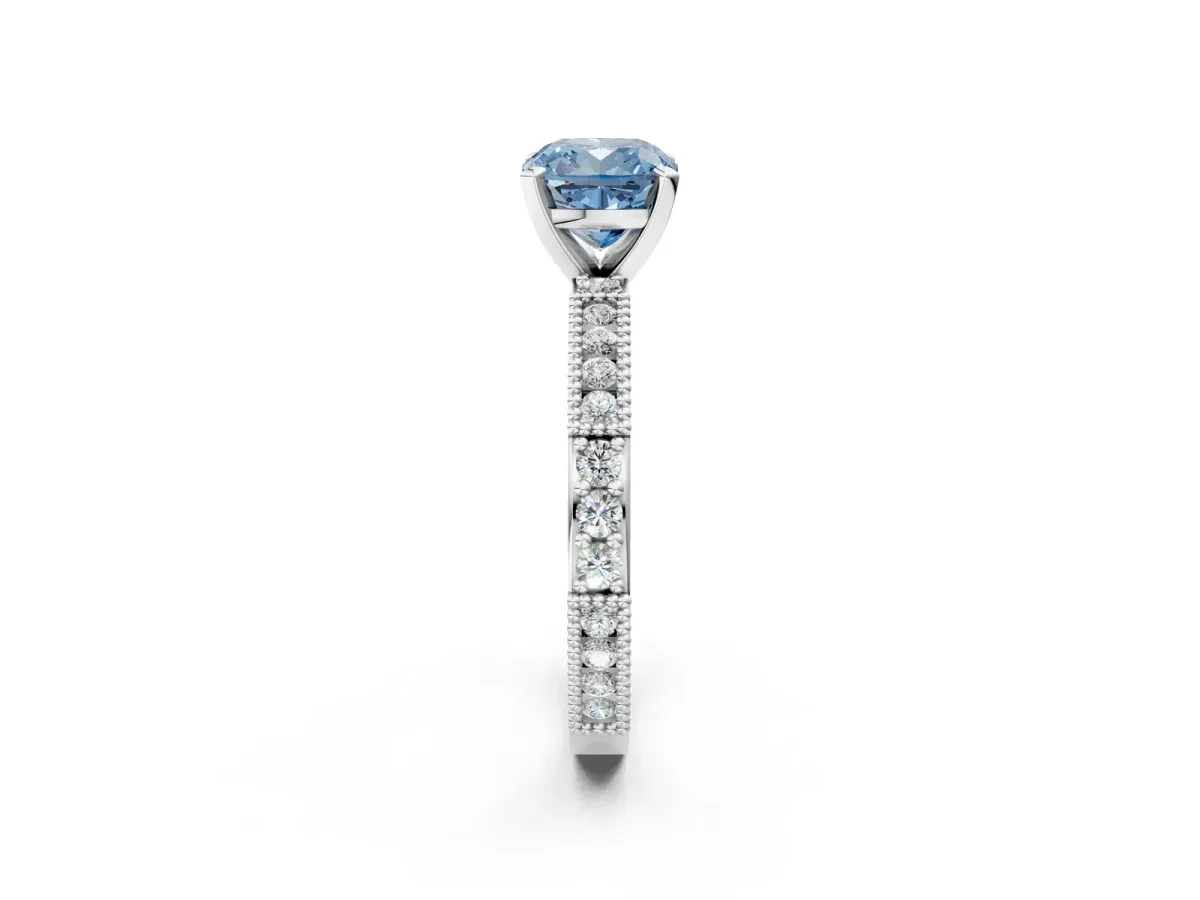 Fancy Blue Cushion Cut Solitaire with Pavé Band and Four-Prong Setting Silver