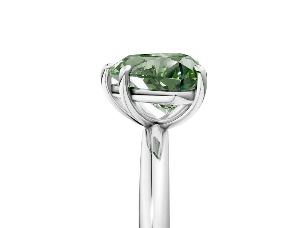 Fancy Green Heart Cut Solitaire Diamond Ring with Four-Prong Setting on a Plain Band Platinum
