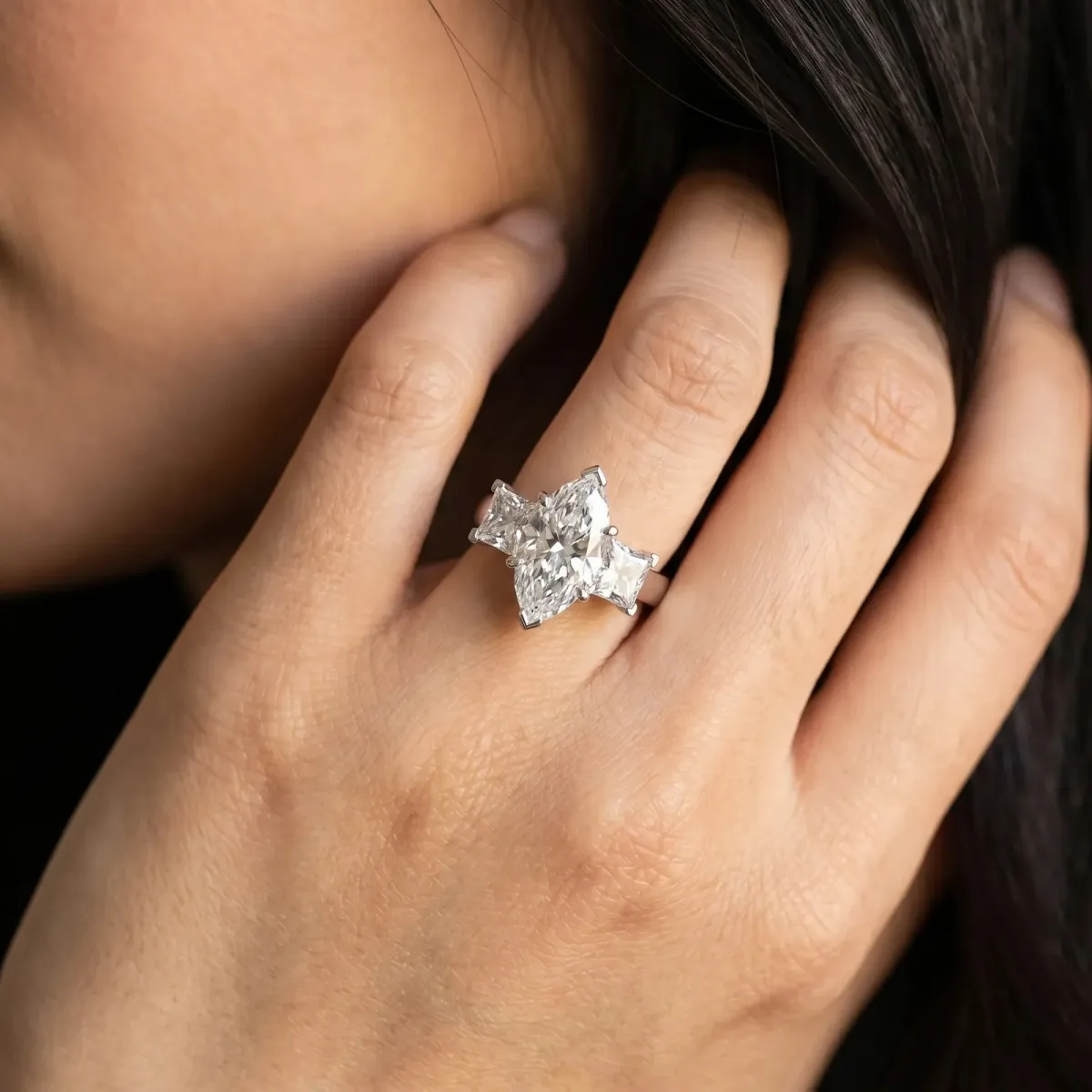Three-Stone Marquise Cut Cut Diamond Ring with Channel Set Band and Four-Prong Setting Platinum