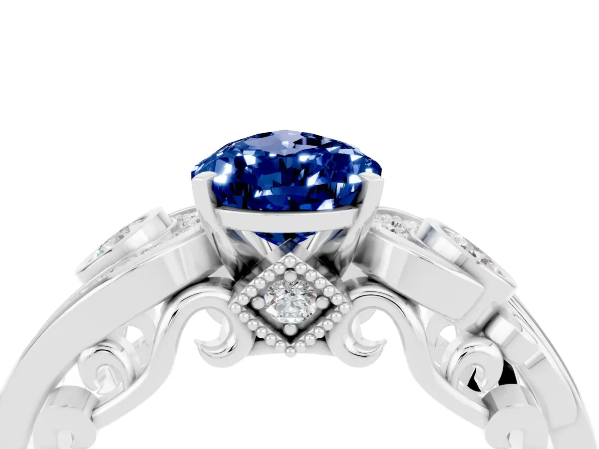 Pear Cut Blue Sapphire Solitaire Ring with Milgrain Pavé Band and Four-Prong Setting Silver