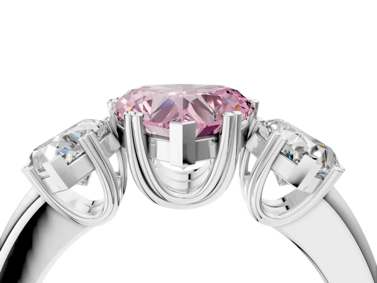 Fancy Pink Three-Stone Heart Cut Cut Diamond Ring with Channel Set Band and Four-Prong Setting Silver