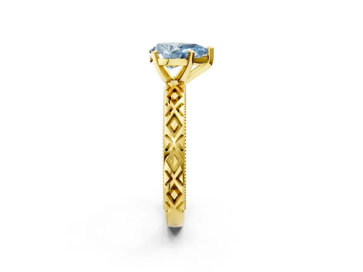 Fancy Blue Pear Cut Solitaire Diamond Ring with Milgrain and Black Enamel X Pattern Band Yellow gold