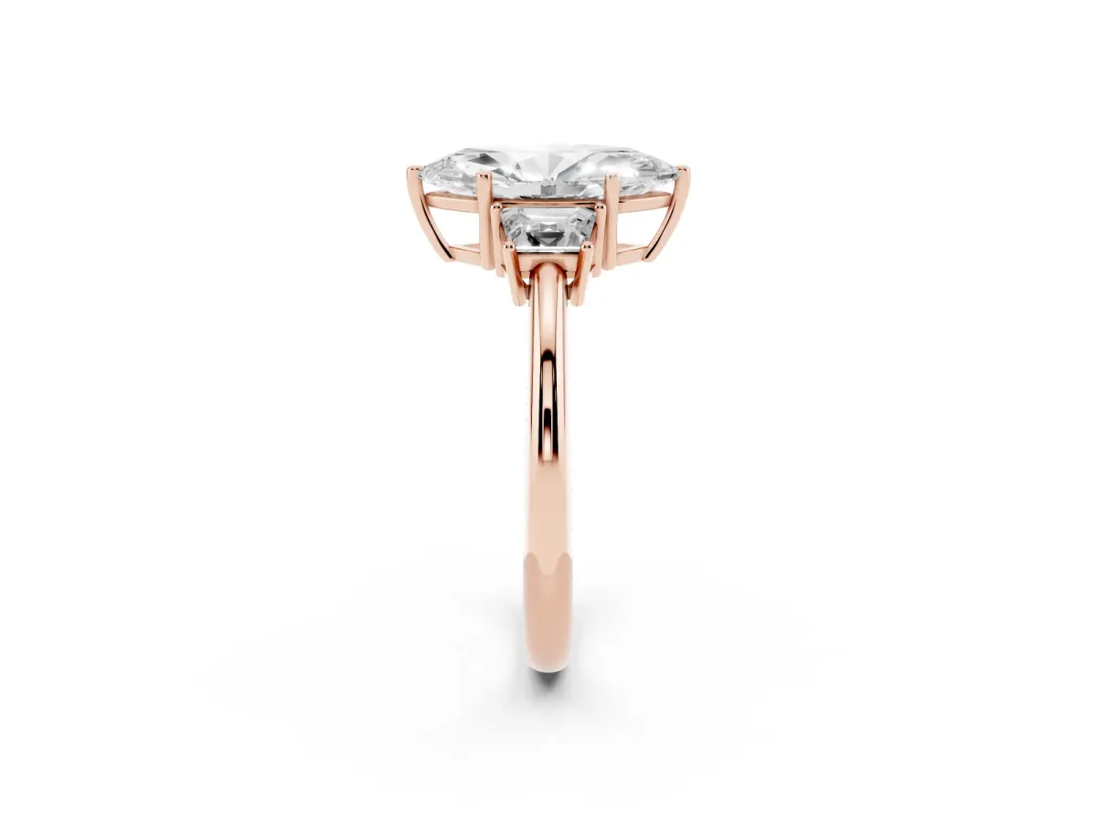 Marquise Cut Diamond Three-Stone Ring with Trapezoid Side Stones and Prong Setting Rose gold