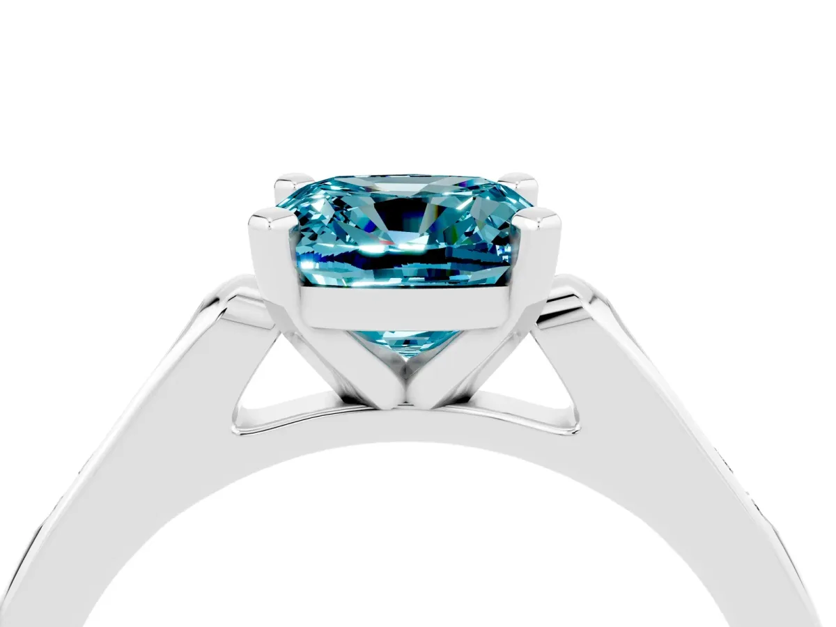 Cushion Cut Blue Topaz Solitaire Ring with Channel Set Round Band and Prong Setting Silver