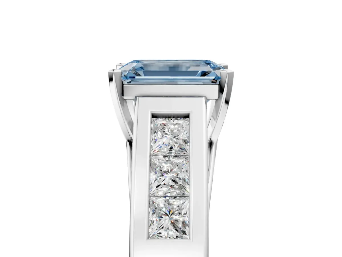 Fancy Blue Emerald Cut Cut Channel Set Solitaire Ring with Four-Prong Setting Silver