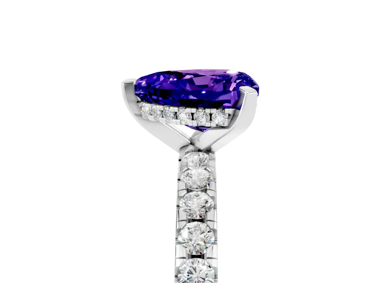 Heart Cut Tanzanite Solitaire Ring with Round Pavé Band and Four-Prong Setting Silver