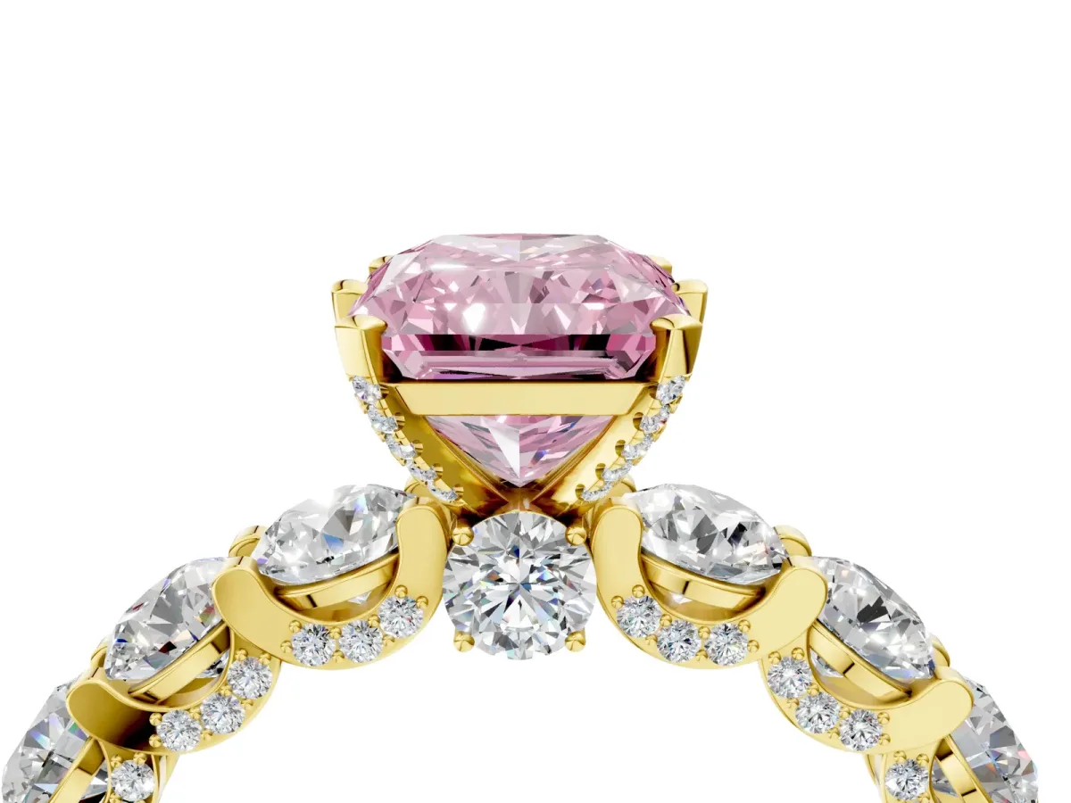 Fancy Pink Radiant Cut Diamond Side Stone Engagement Ring with Four-Prong Setting Yellow gold