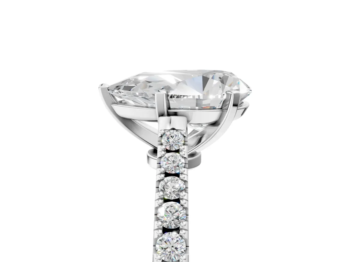 Pear Cut Cut Solitaire Diamond Engagement Ring with Pave Band and Four-Prong Setting Silver