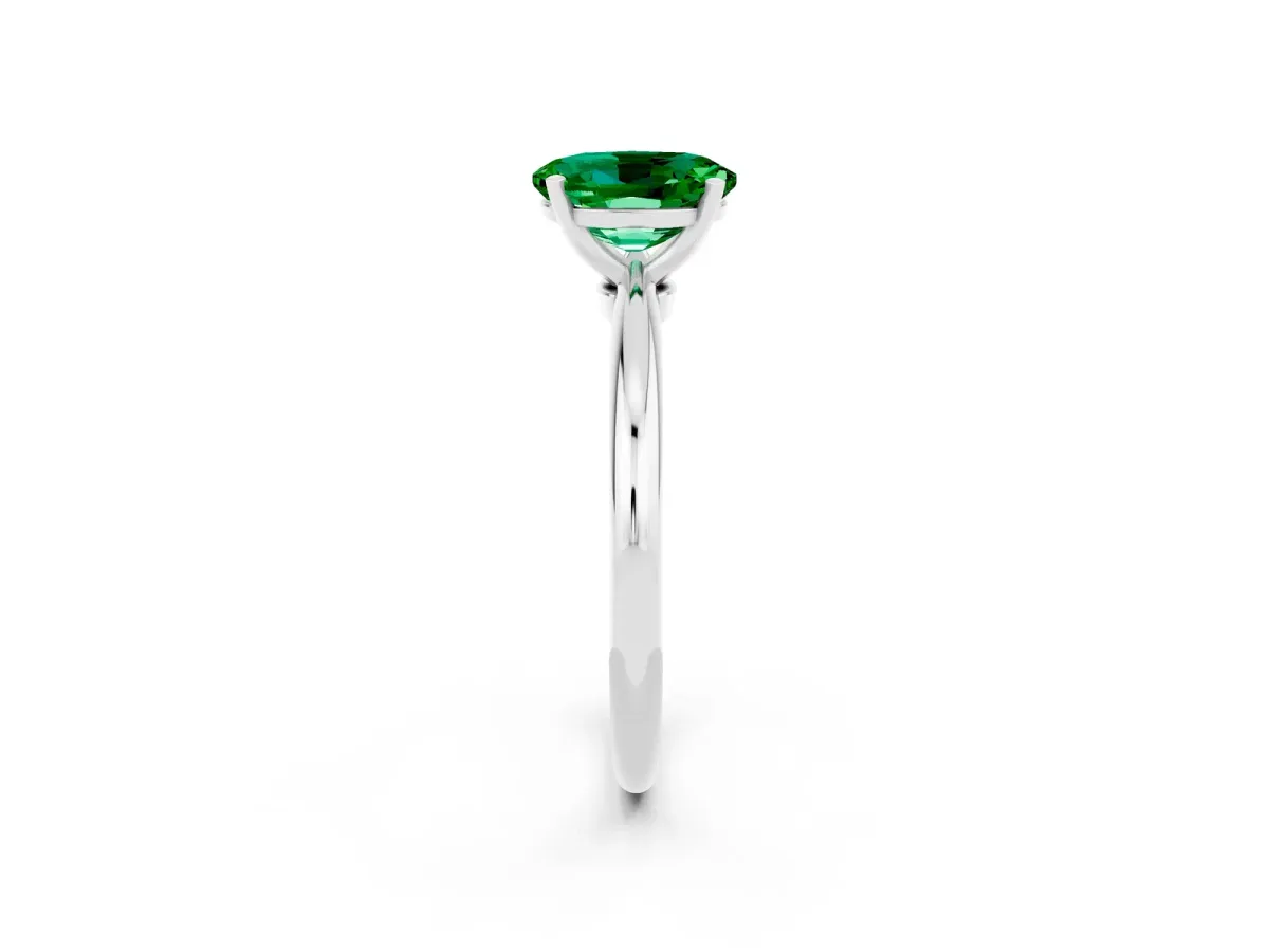 Oval Cut Emerald Solitaire Ring with Six-Prong Setting and Classic Band Silver