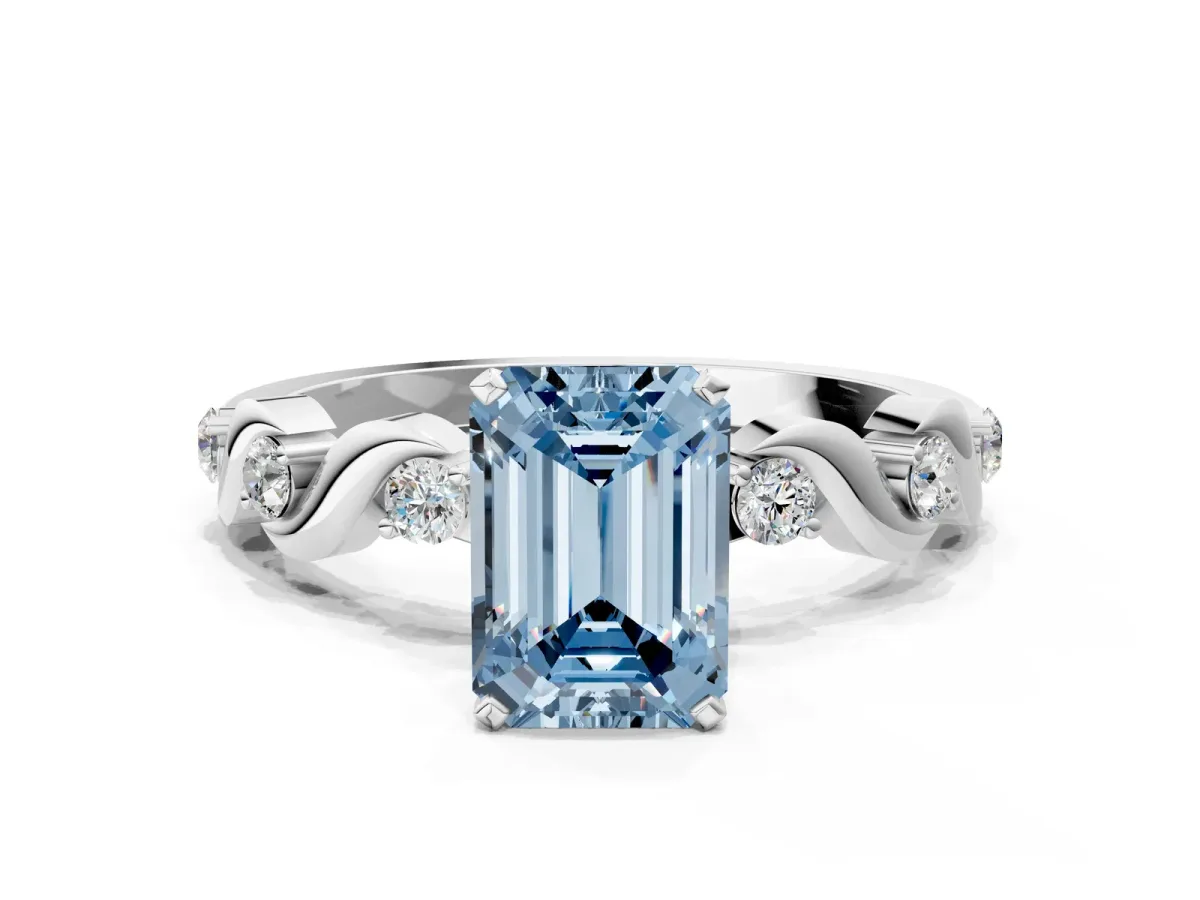 Fancy Blue Emerald Cut Diamond Solitaire Twisted Band with Round Accents and Prong Setting Silver