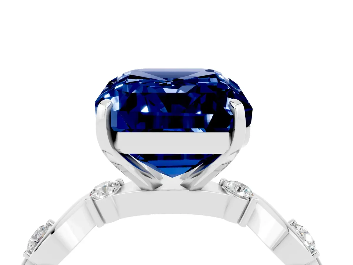 Emerald Cut Blue Sapphire Solitaire Twisted Band with Round Accents and Prong Setting Silver