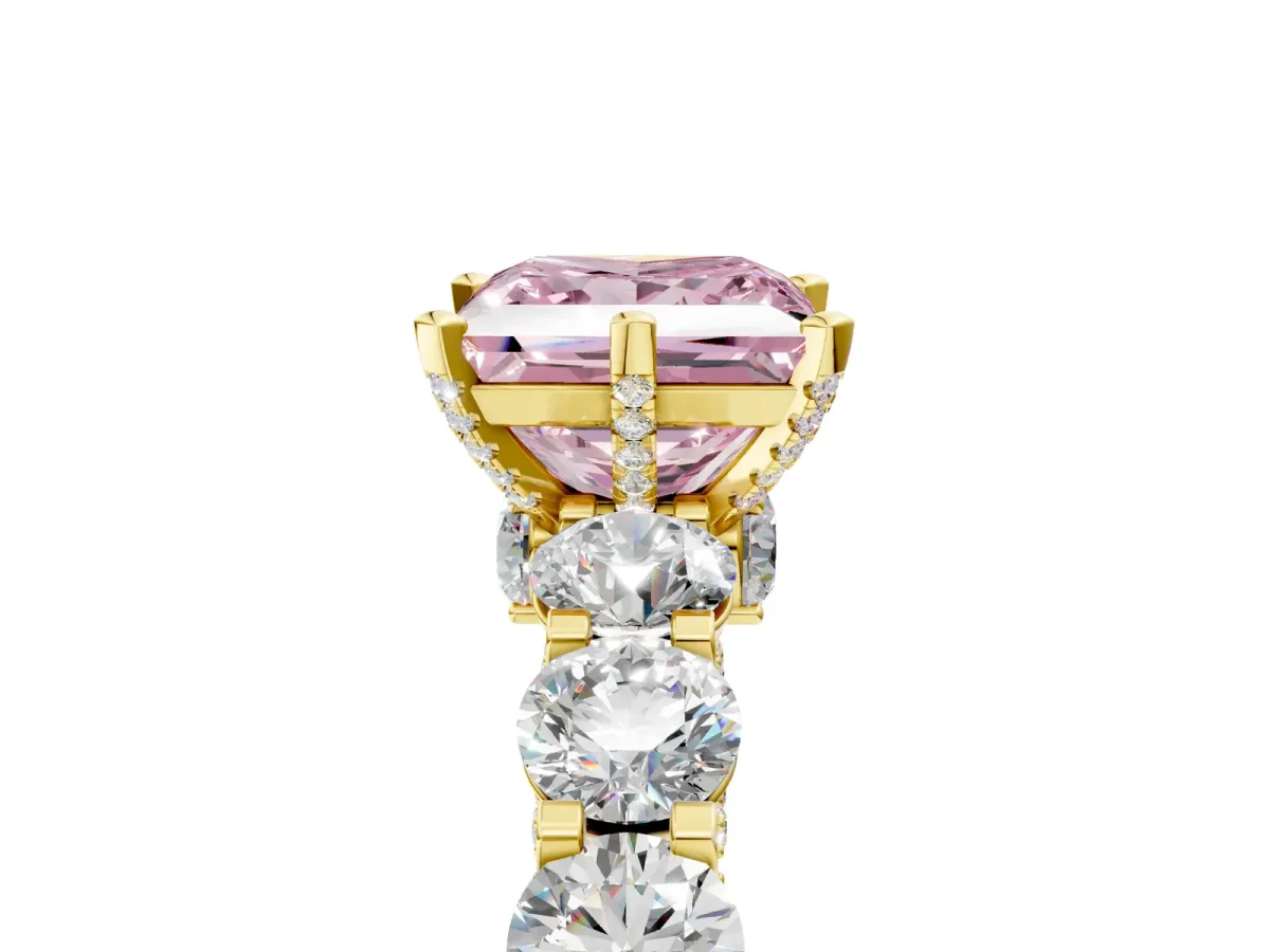 Fancy Pink Princess Cut Diamond Side Stone Engagement Ring with Four-Prong Setting Yellow gold