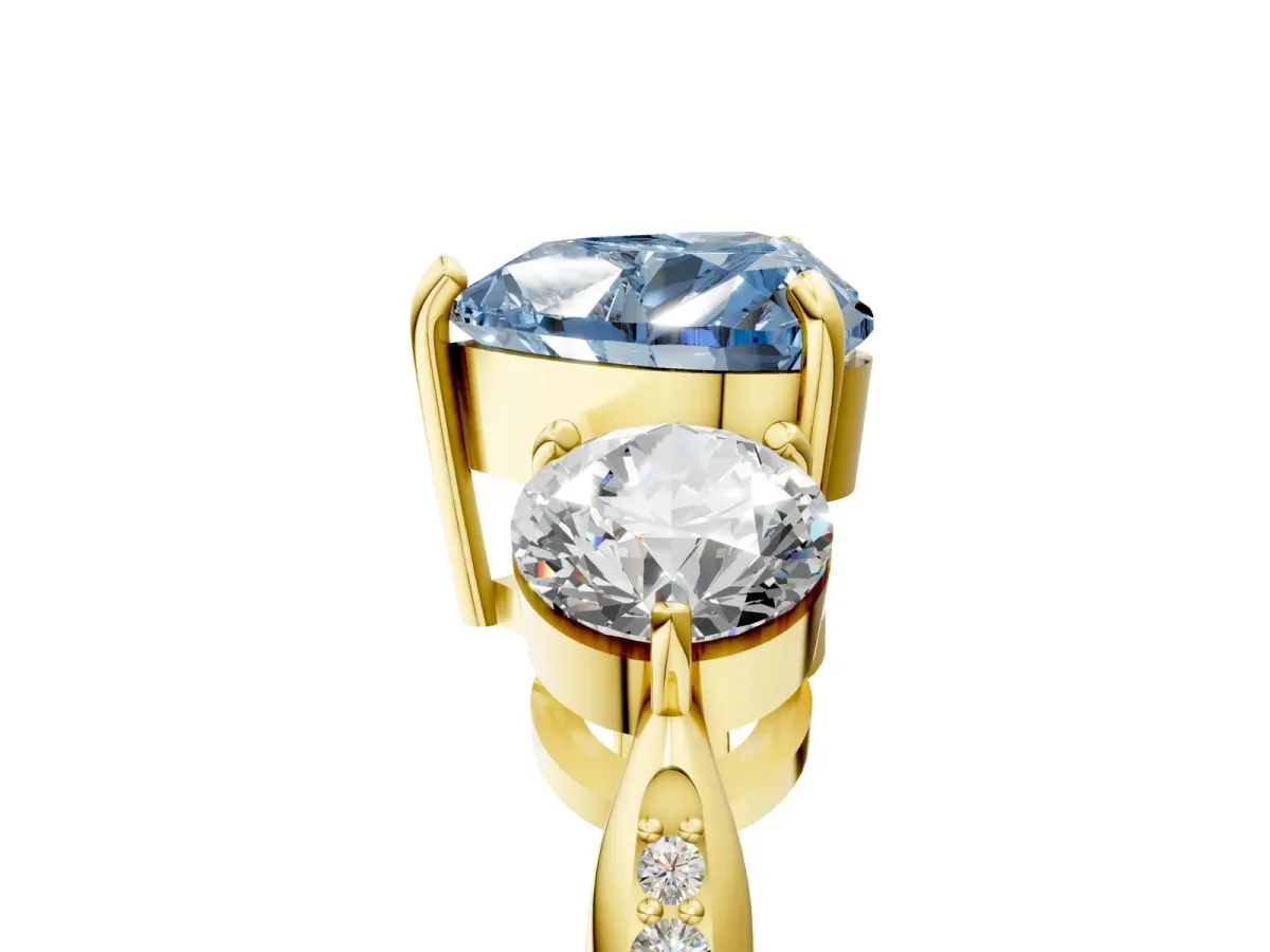 Fancy Blue Three-Stone Heart Cut Diamond Channel Set Engagement Ring with Prong Setting Yellow gold