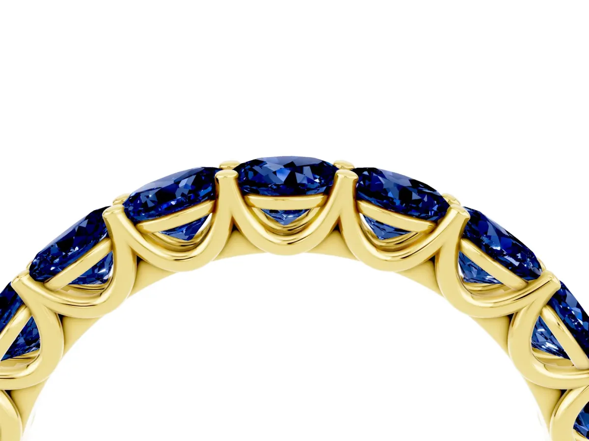 Round Blue Sapphire Shared Prong Eternity Band Yellow gold