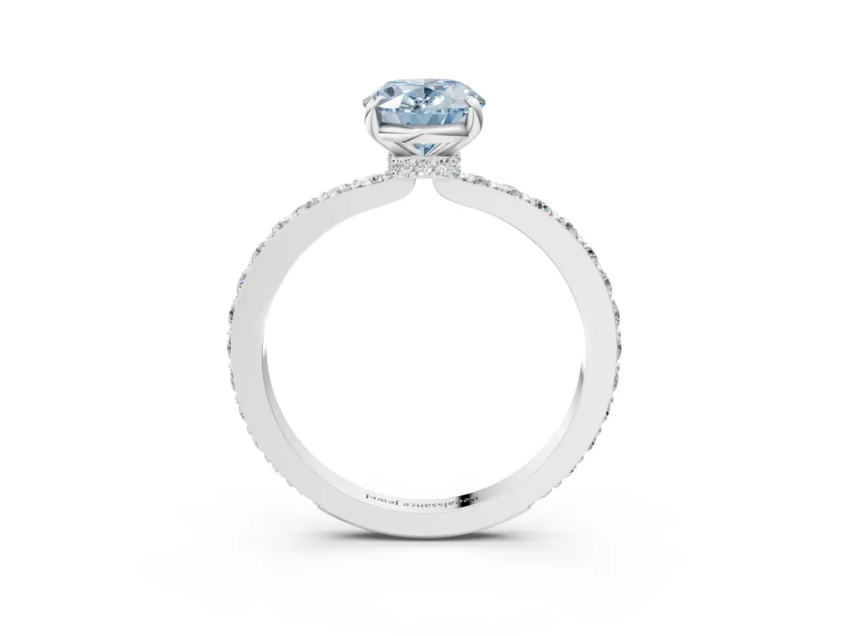 Fancy Blue Oval Cut Diamond Solitaire Engagement Ring with Pavé Band and Four-Prong Setting Silver