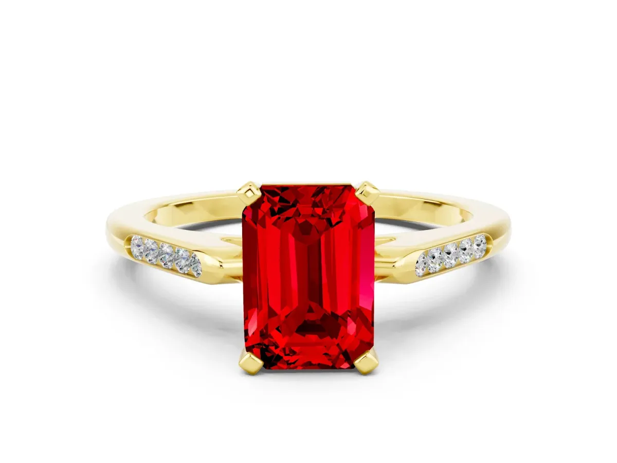Emerald Cut Ruby Solitaire Ring with Channel Set Round Band and Prong Setting Yellow gold