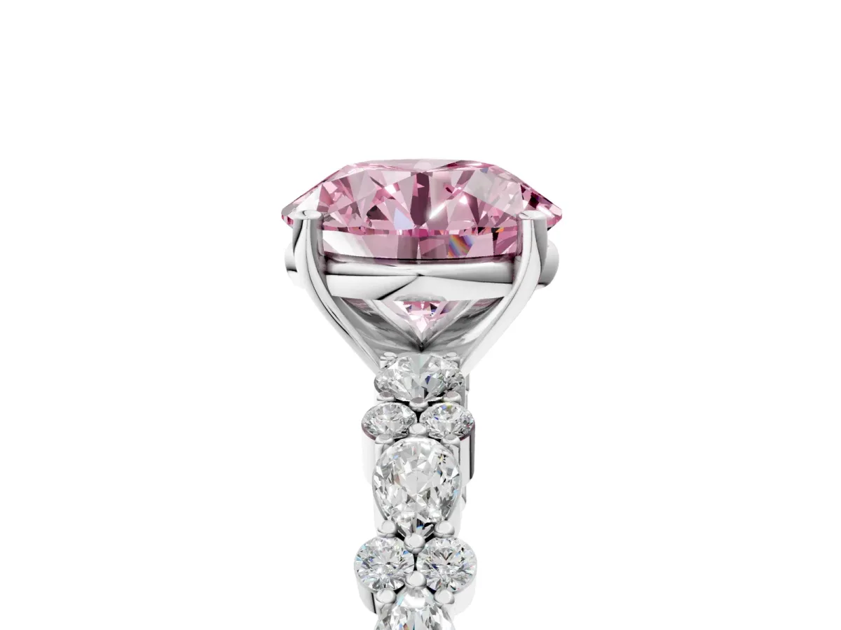 Fancy Pink Round Cut Diamond Side Stone Solitaire Ring with Round and Four-Prong Setting Silver