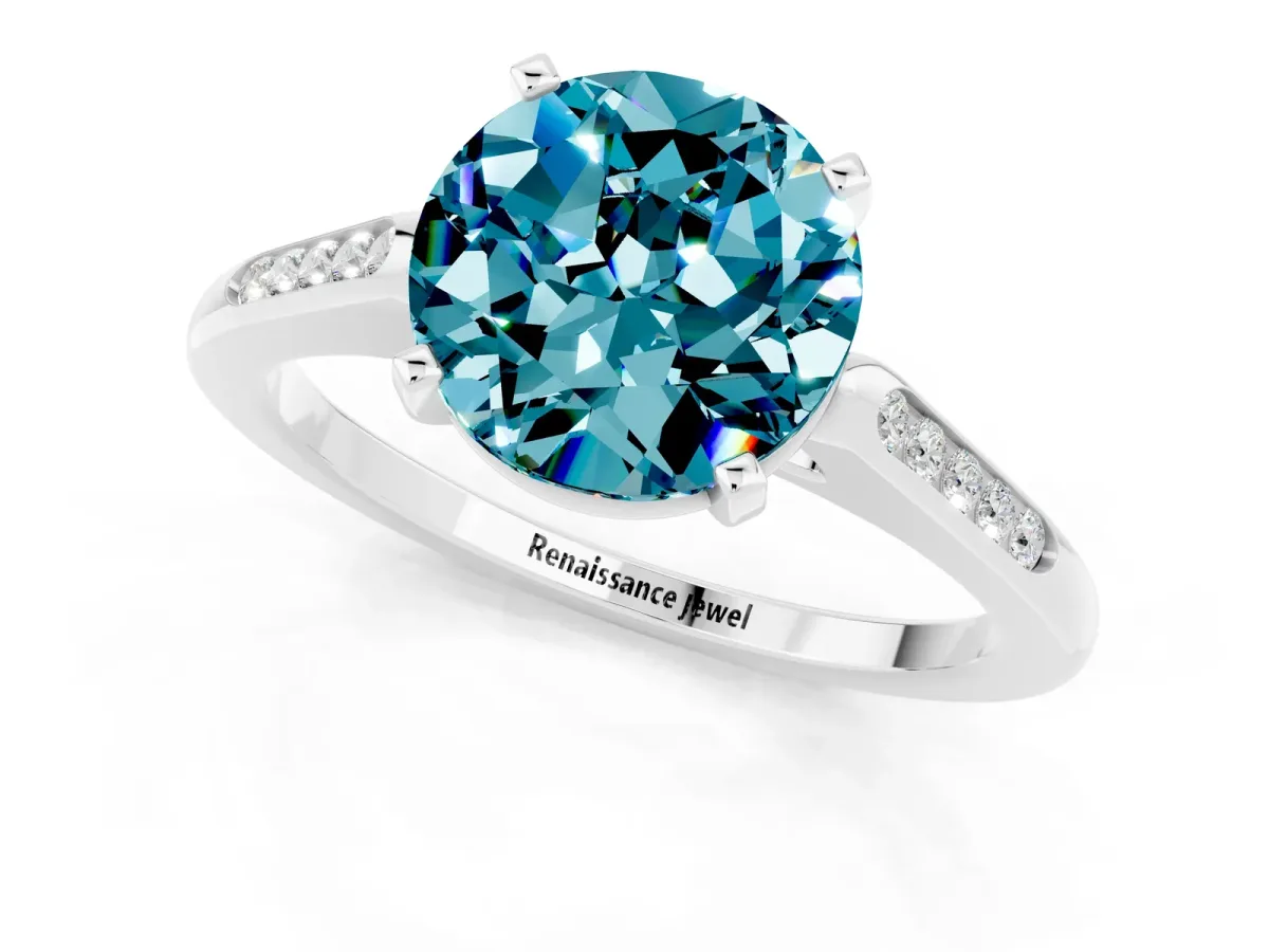 Round Cut Blue Topaz Solitaire Ring with Channel Set Round Band and Prong Setting Silver