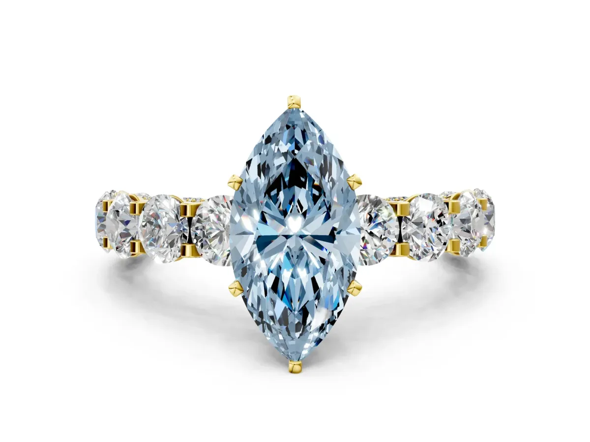 Fancy Blue Marquise Cut Diamond Side Stone Engagement Ring with Four-Prong Setting Yellow gold