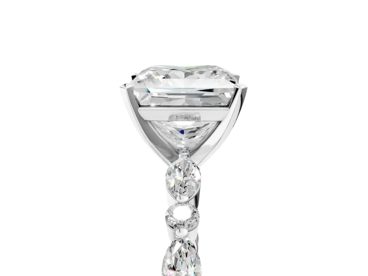 Princess Cut Diamond Ring with Marquise and Round Side Stones and Four-Prong Setting Silver