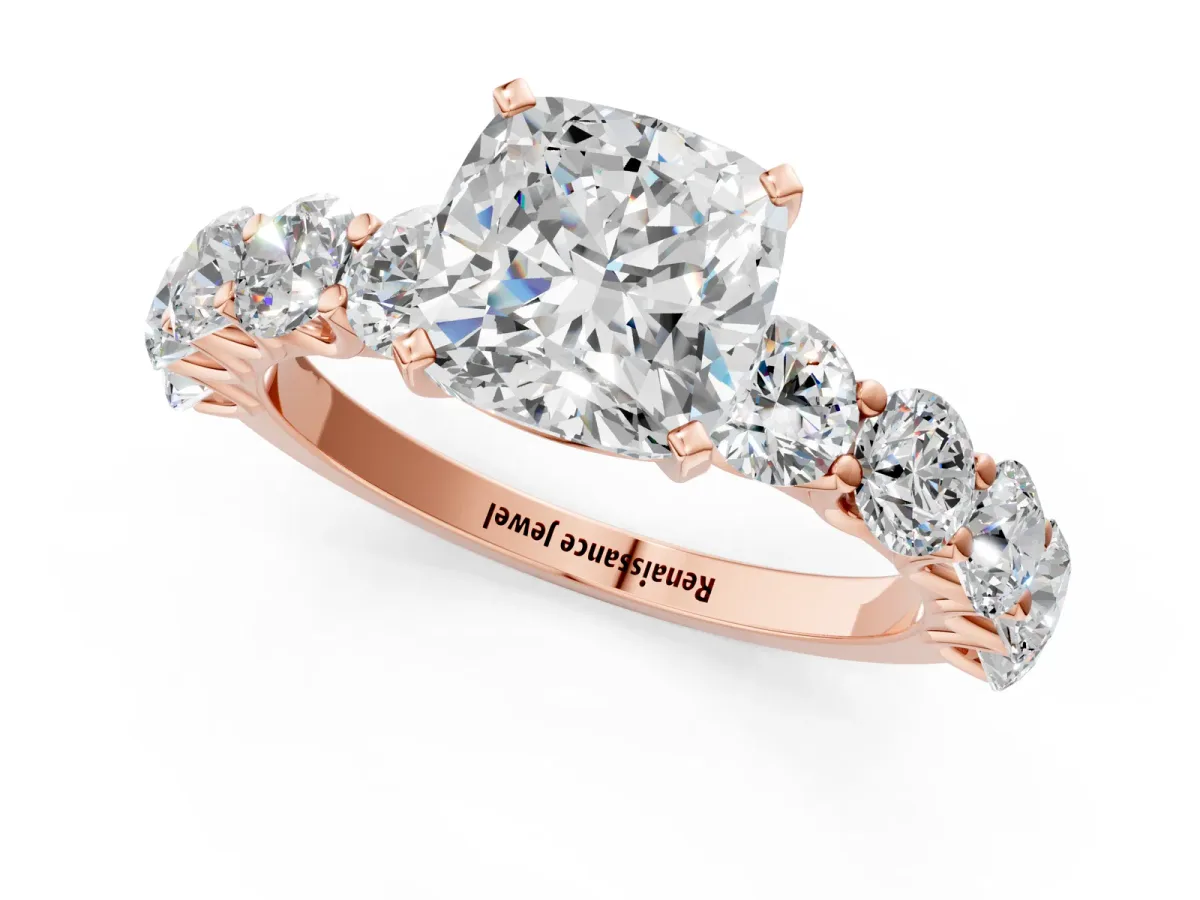 Cushion Cut Diamond Prong Setting with Side Stones on a Pave Band Rose gold