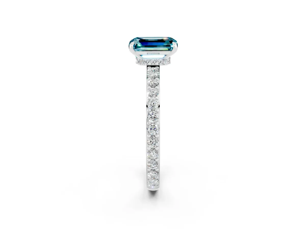 Emerald Cut Blue Topaz Solitaire Engagement Ring with Pavé Band and Four-Prong Setting Silver