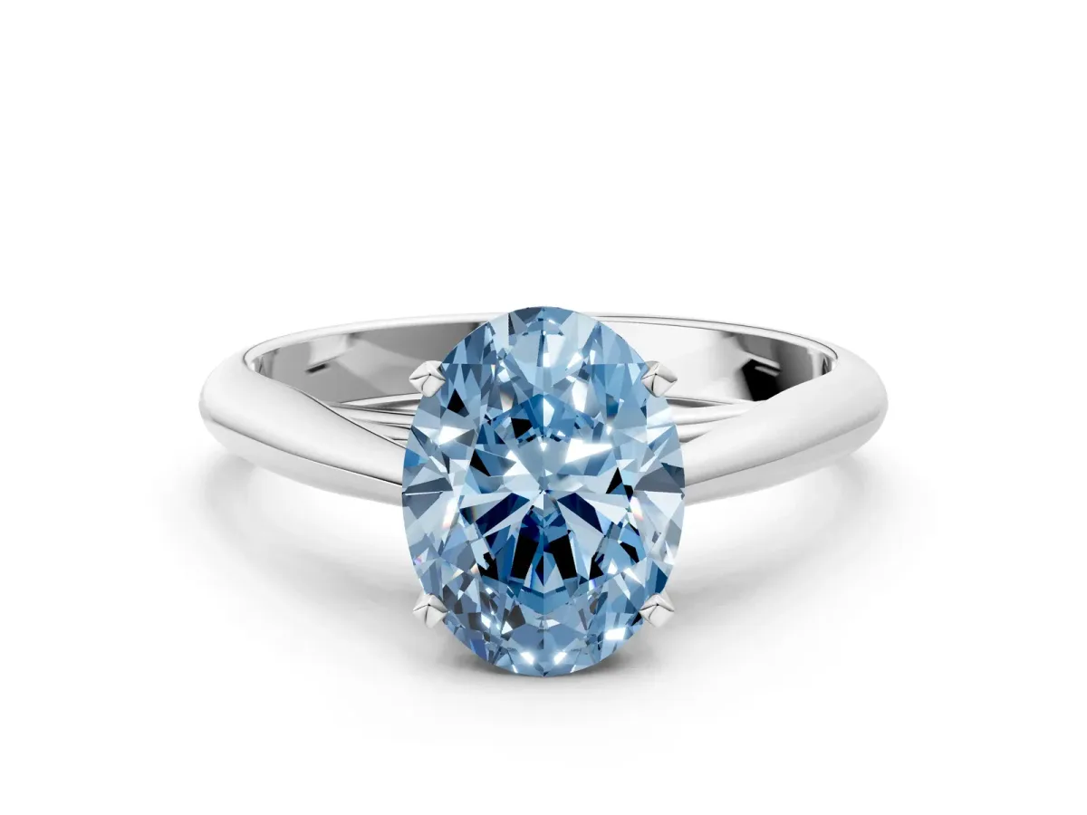 Fancy Blue Oval Cut Diamond Solitaire Engagement Ring with Cathedral Setting and Four-Prong Mount White gold