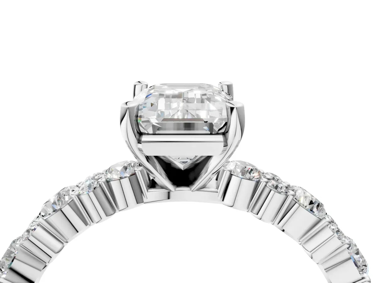 Emerald Cut Diamond Side Stone Solitaire Ring with Round and Four-Prong Setting Platinum