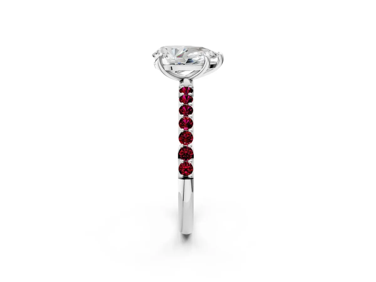 Pear Cut Diamond Solitaire Ring with Round Garnet Pavé Band and Prong Setting Silver