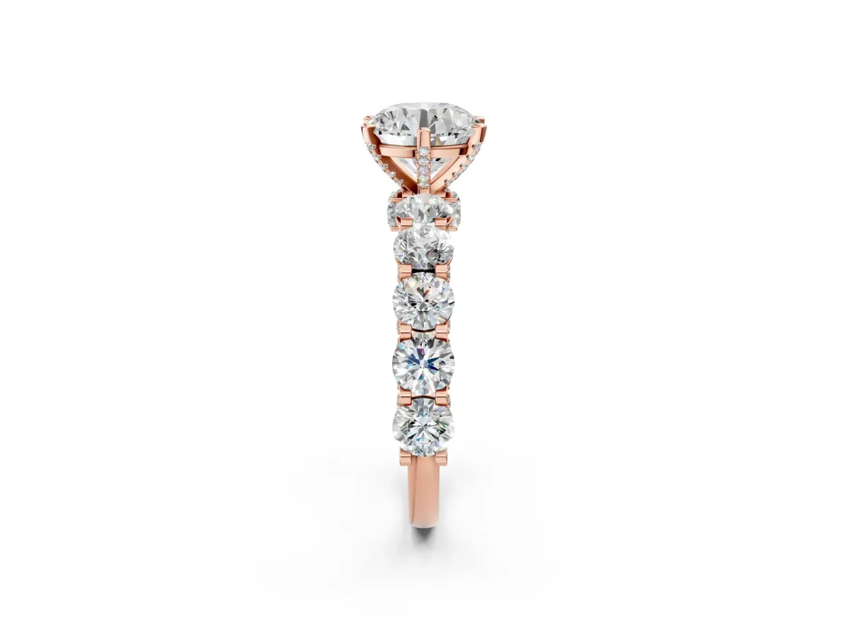 Round Cut Diamond Side Stone Engagement Ring with Four-Prong Setting Rose gold