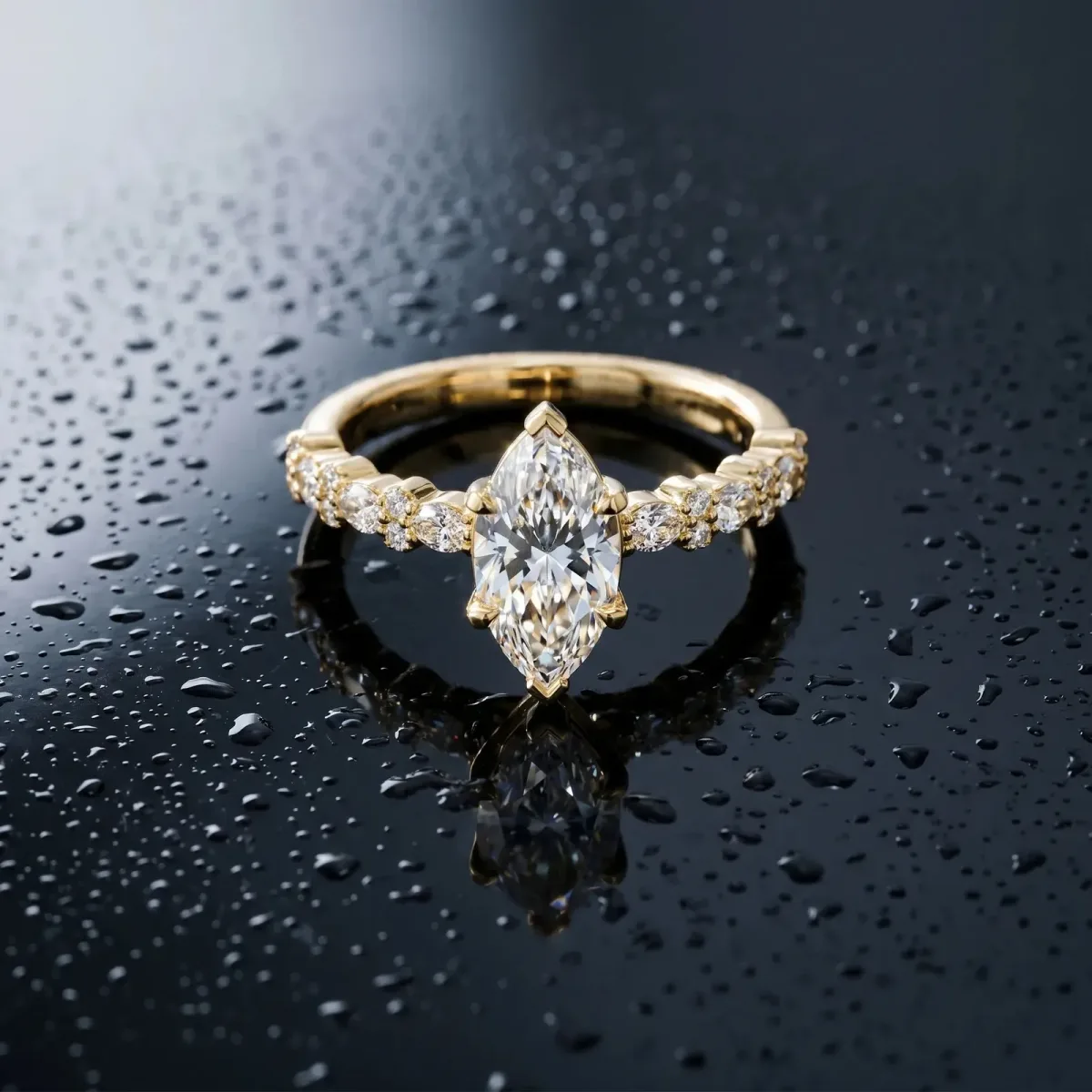Marquise Cut Diamond Side Stone Solitaire Ring with Round and Four-Prong Setting Yellow gold