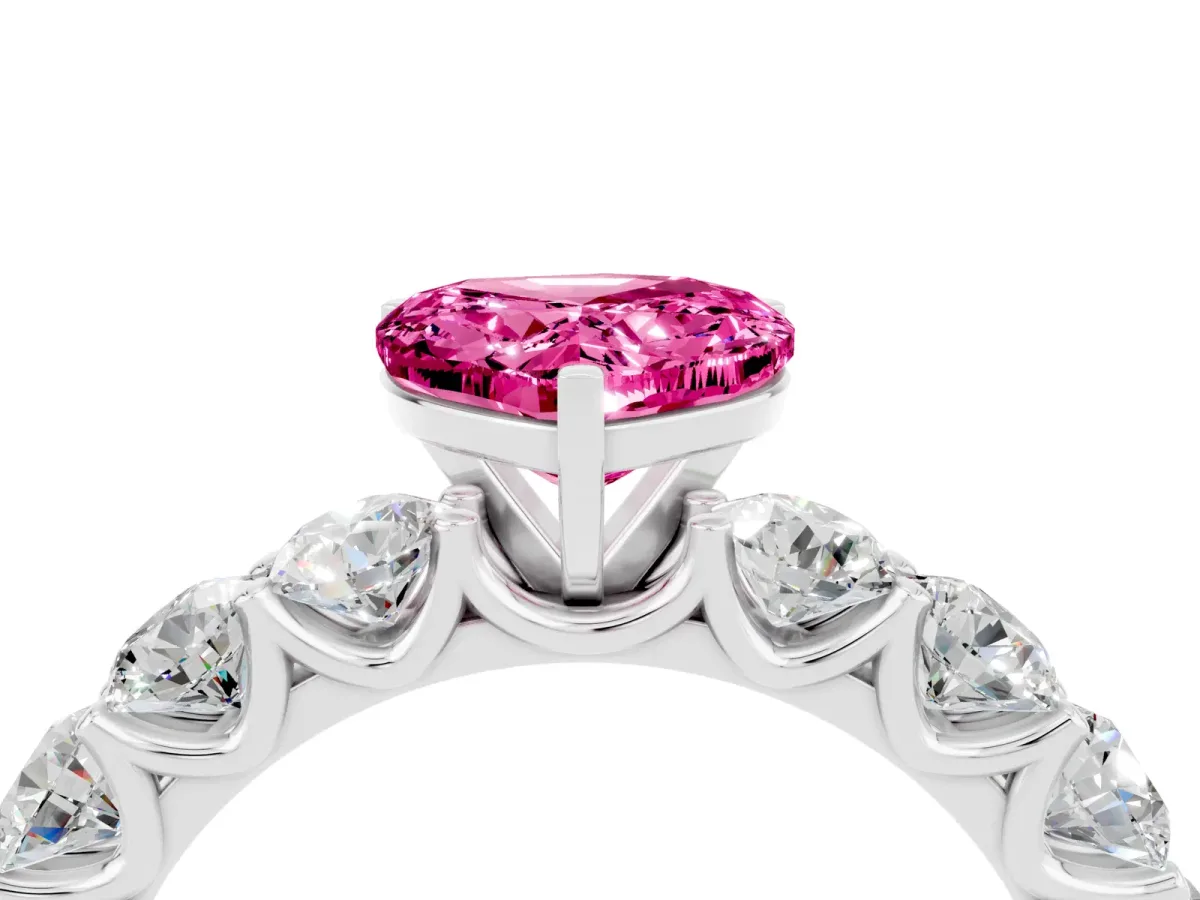 Heart Cut Pink Sapphire Prong Setting with Side Stones on a Pave Band Silver