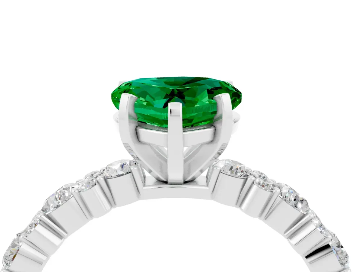 Heart Cut Emerald Side Stone Solitaire Ring with Round and Four-Prong Setting Silver