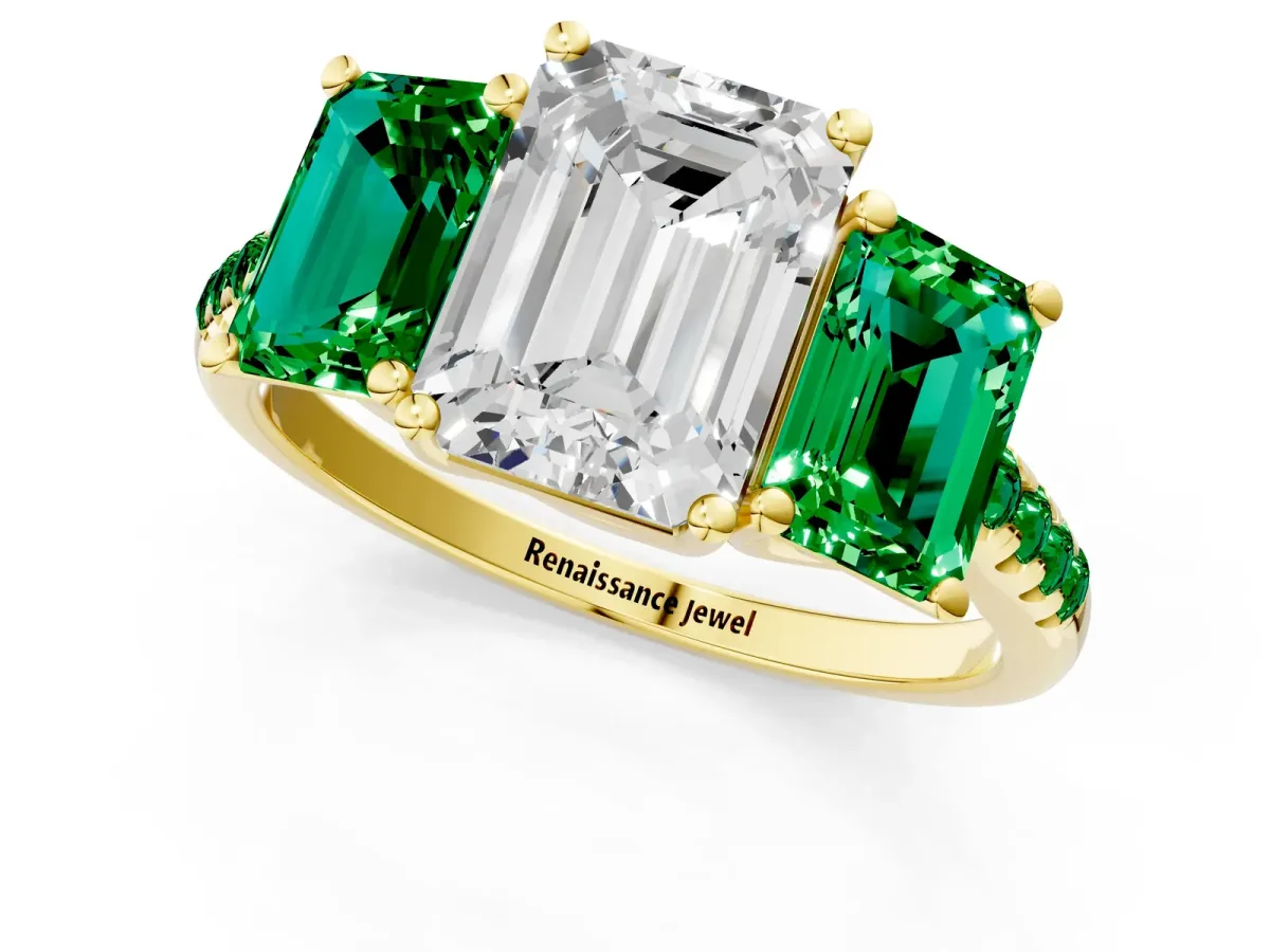 Three-Stone Emerald Cut Diamond Ring with Round Emerald Pavé Band and Prong Setting Yellow gold