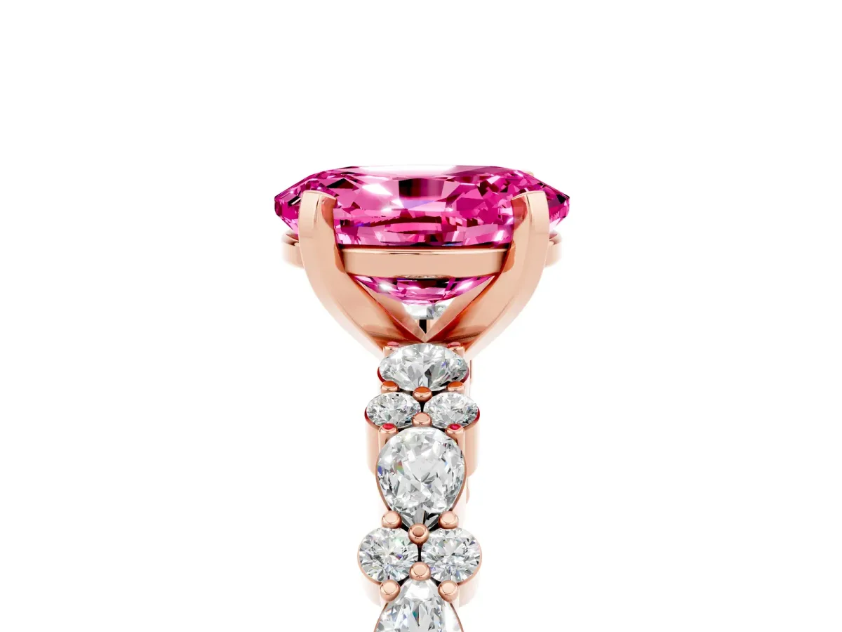 Oval Cut Pink Sapphire Side Stone Solitaire Ring with Round and Four-Prong Setting Rose gold