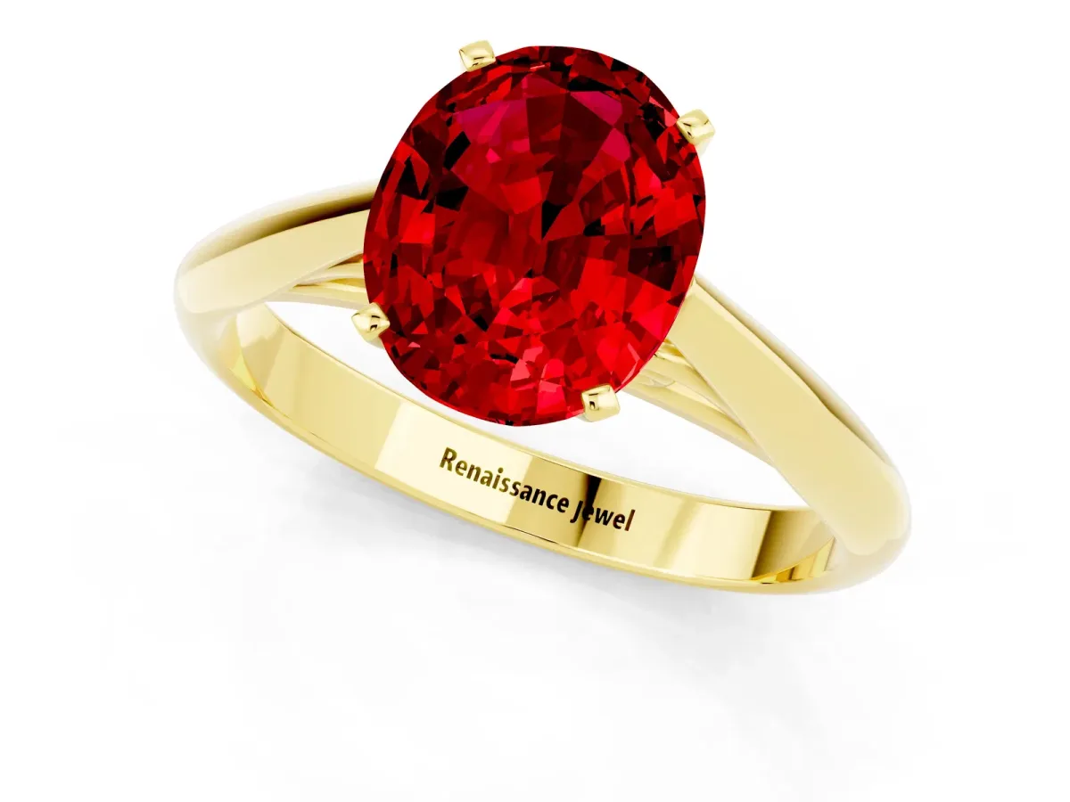 Oval Cut Ruby Solitaire Engagement Ring with Cathedral Setting and Four-Prong Mount Yellow gold