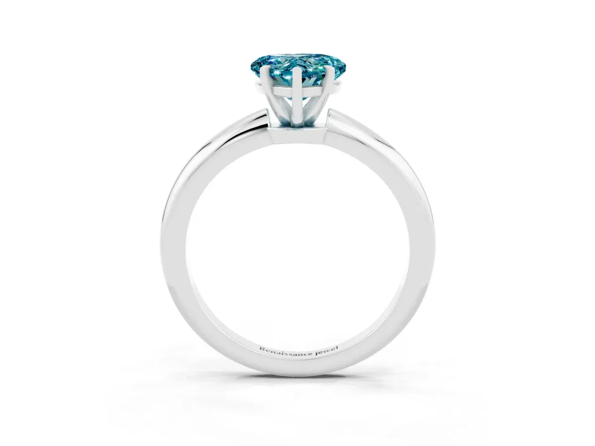 Heart Cut Blue Topaz Solitaire Ring with Six-Prong Setting and Classic Band Silver