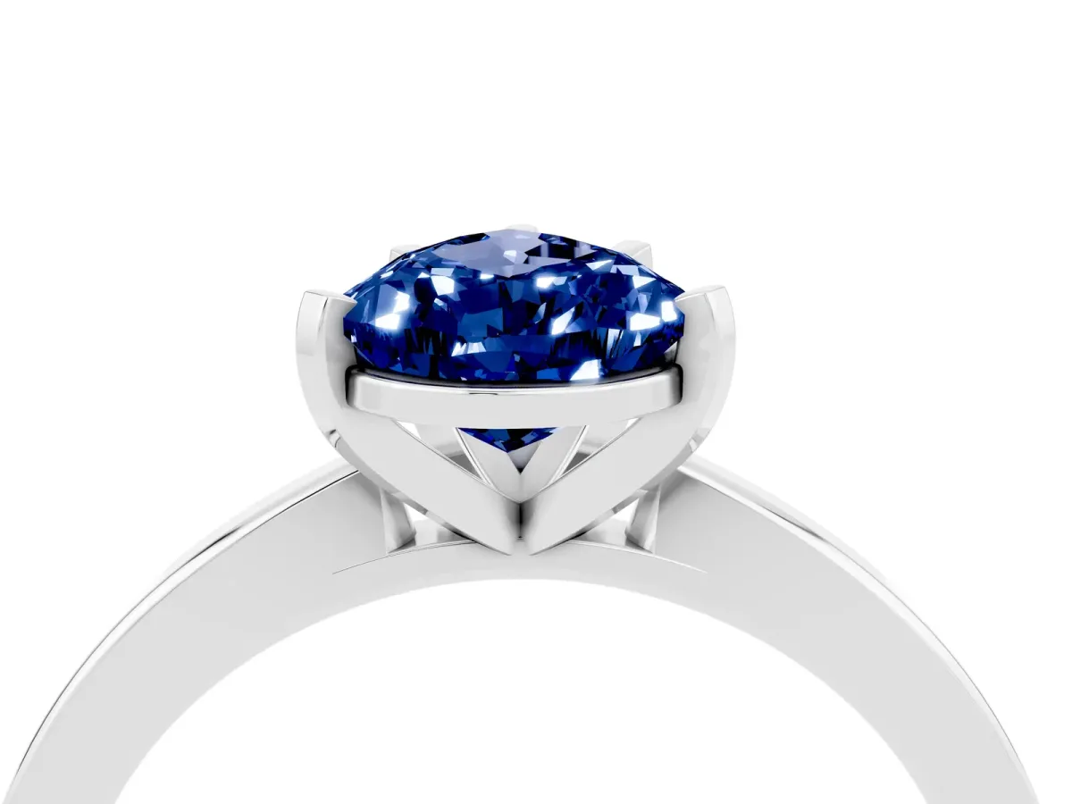 Pear Cut Blue Sapphire Solitaire Engagement Ring with Classic Band and Four-Prong Setting Silver