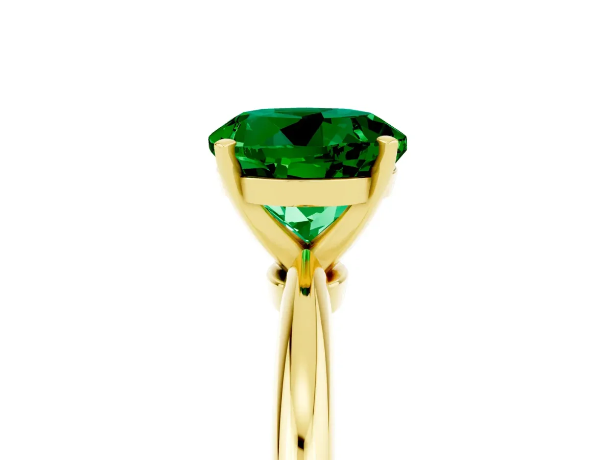 Round Cut Emerald Solitaire Ring with Six-Prong Setting and Classic Band Yellow gold