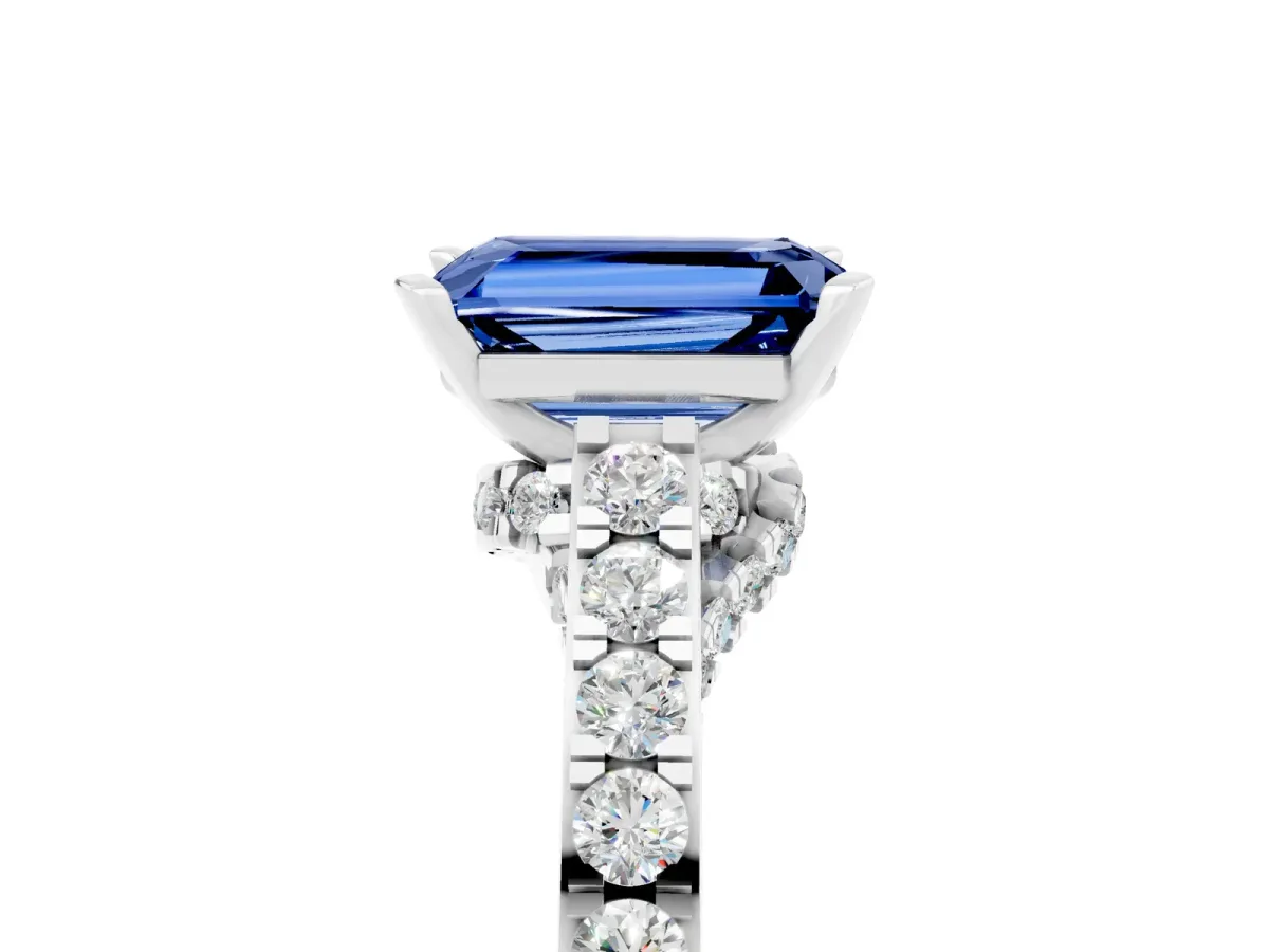 Emerald Cut Blue Sapphire Solitaire Ring with Crossover Gallery and Round Pavé Band Silver