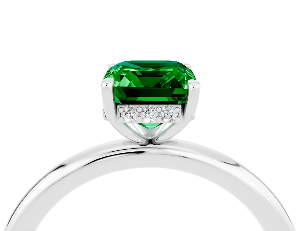 Emerald Cut Emerald Solitaire Ring with Thin Band and Four-Prong Setting White gold